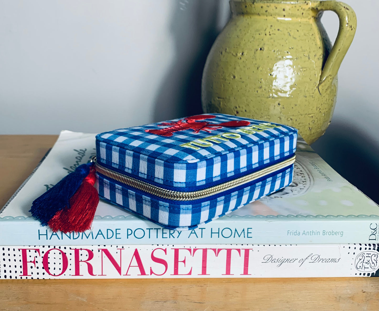 Blue gingham zip pouch/makeup bag with embroidered red lobster, and red & blue tassels