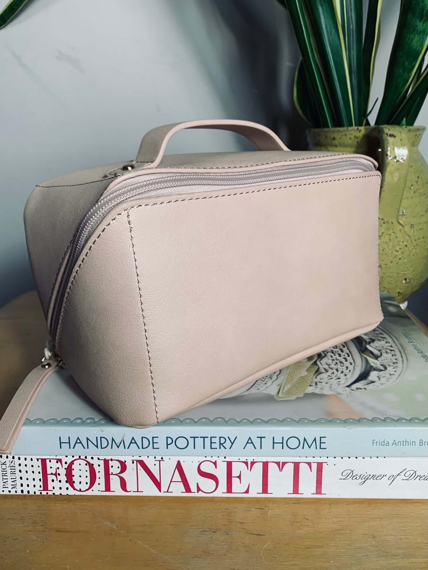 Rectangular Diagonal blush pink faux leather makeup/vanity case bag with zip and top handle