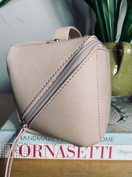 Rectangular Diagonal blush pink faux leather makeup/vanity case bag with zip and top handle