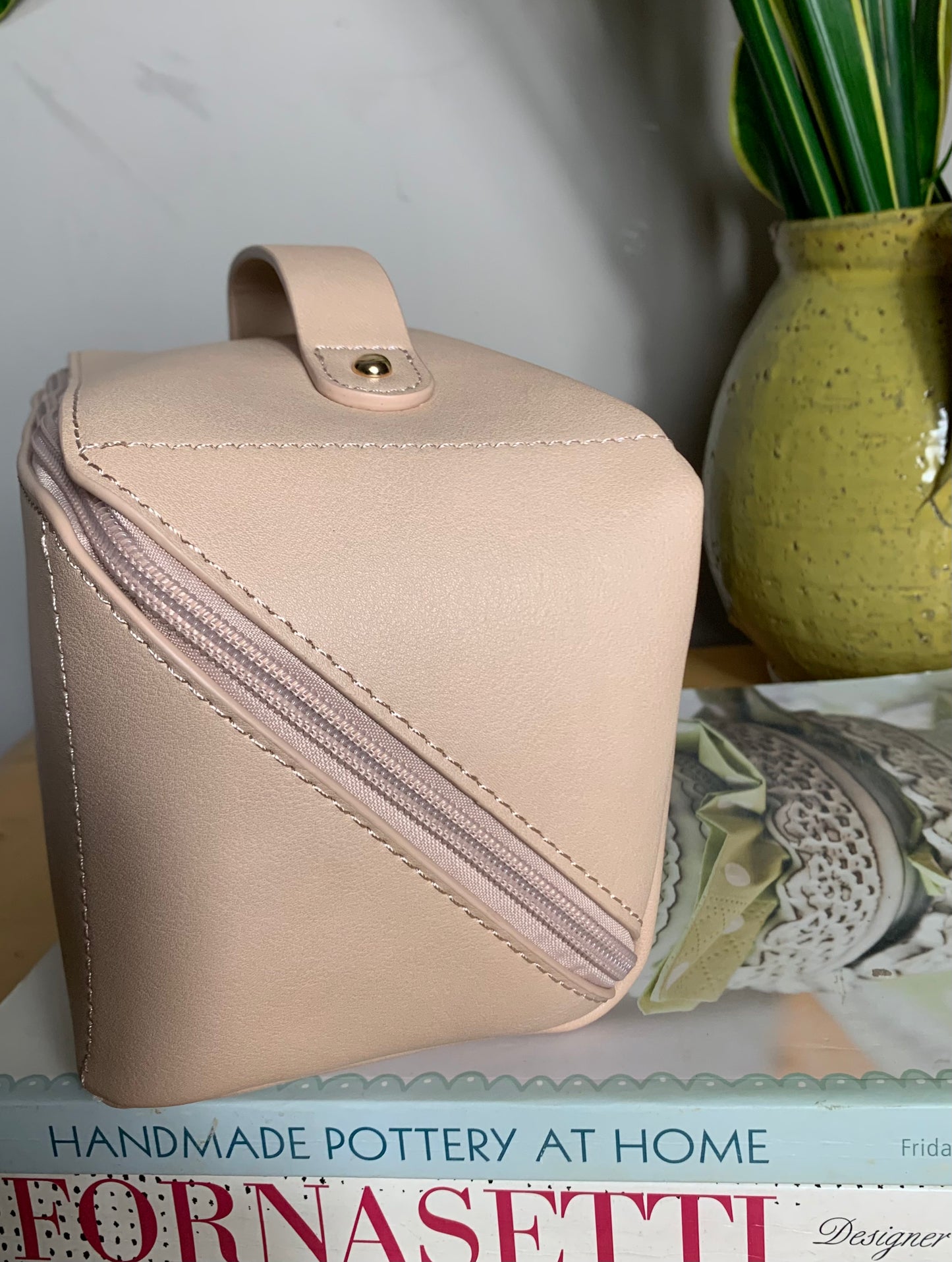 Rectangular Diagonal blush pink faux leather makeup/vanity case bag with zip and top handle