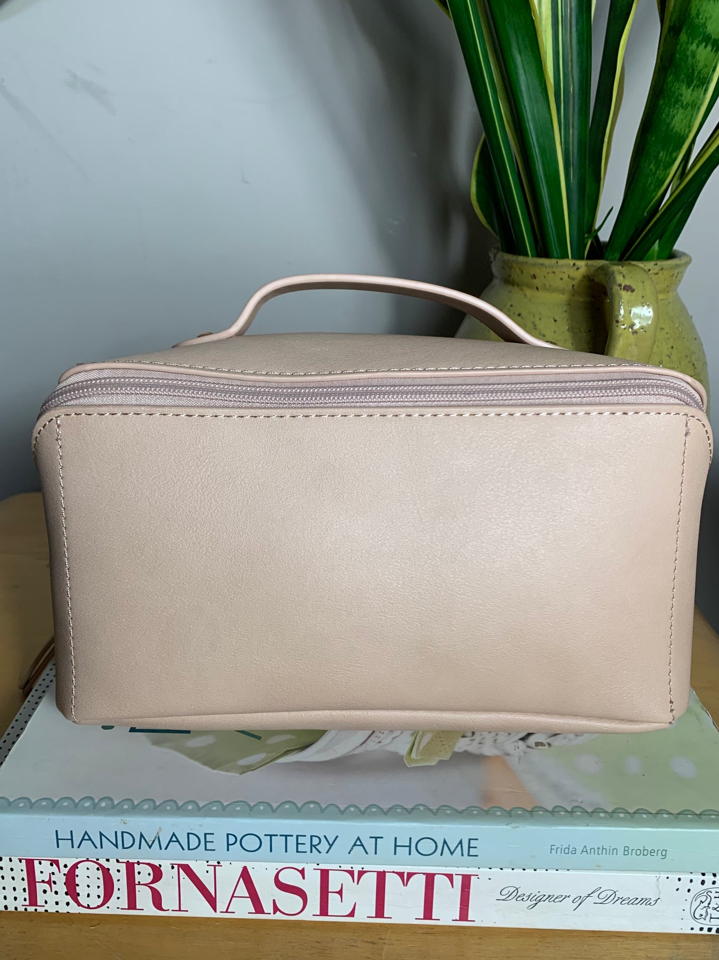 Rectangular Diagonal blush pink faux leather makeup/vanity case bag with zip and top handle